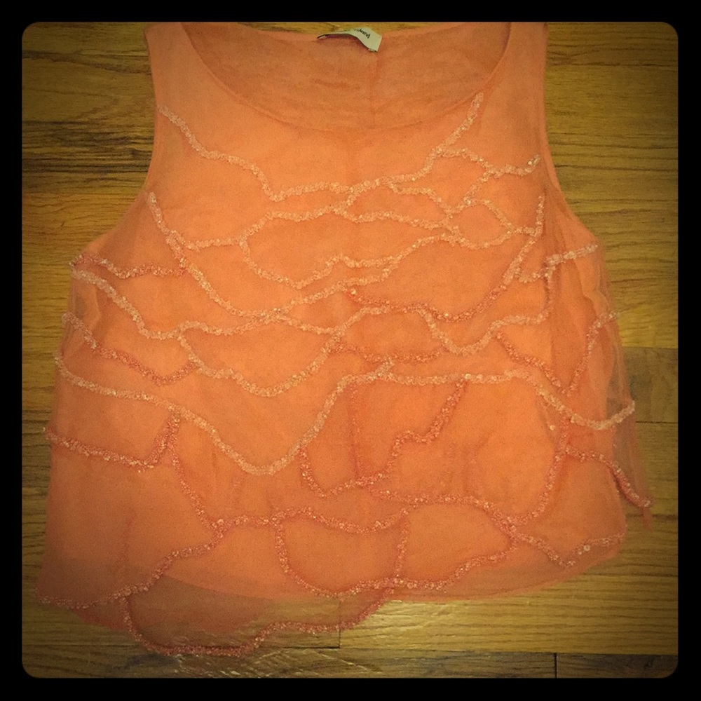 Coral colored organza beaded top.